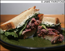 Flour Bakery + Café’s roasted-lamb, tomato-chutney, and goat-cheese sandwich